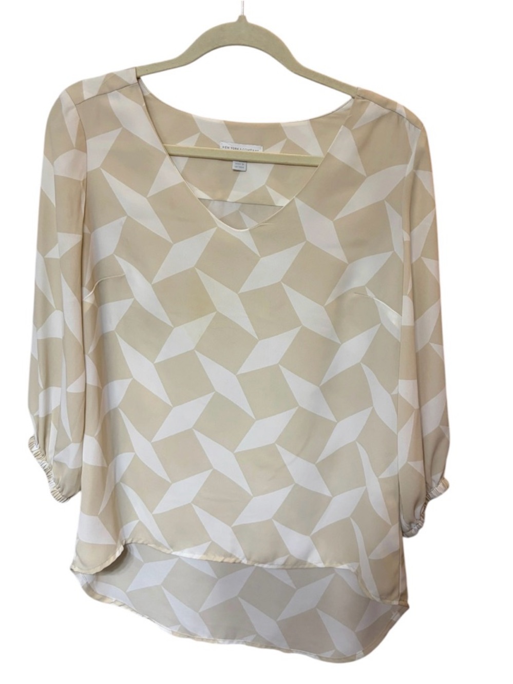 New York & Company Beige and White Geometric V-Neck Blouse